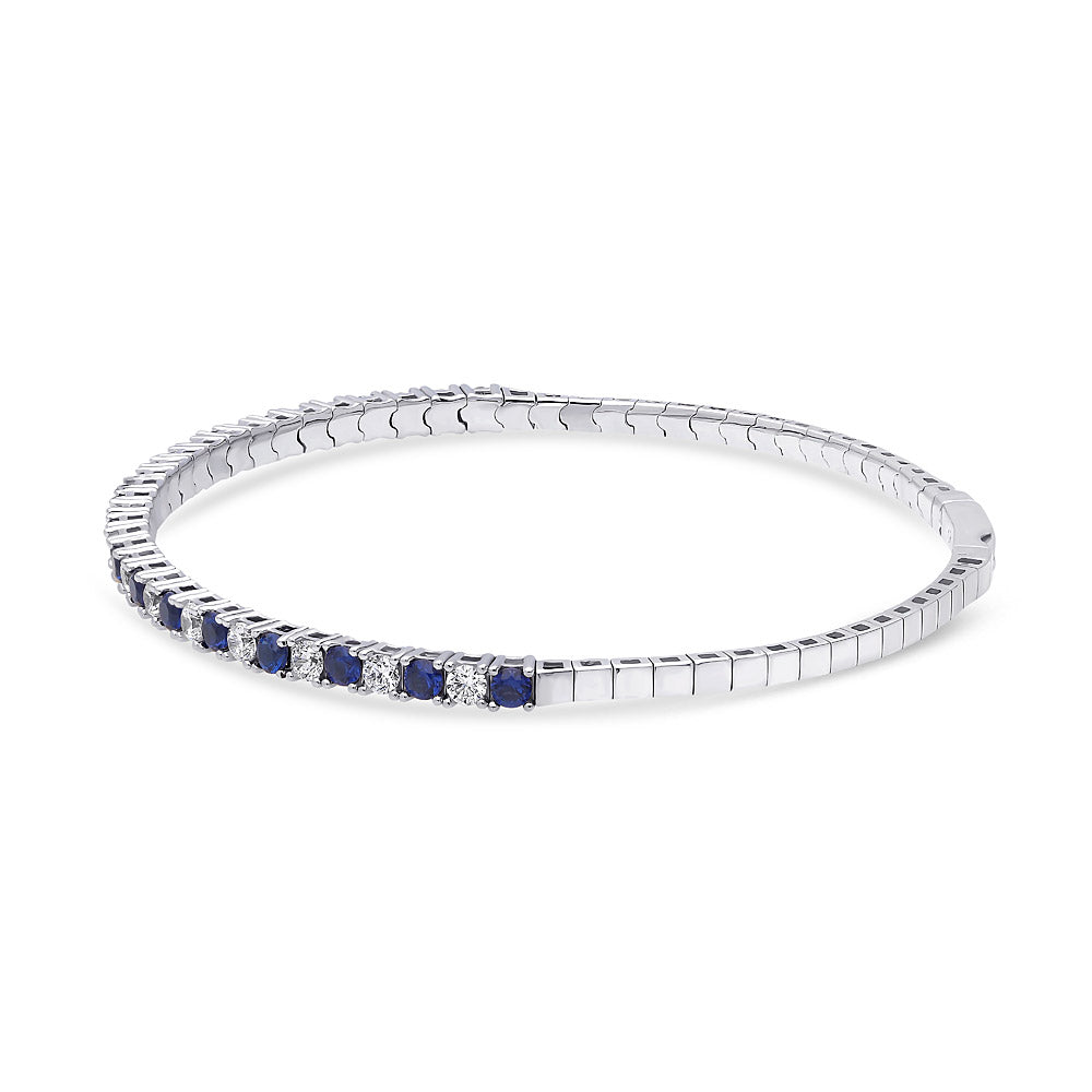 Front view of Flexible Simulated Blue Sapphire CZ Bangle in Sterling Silver, 3 of 9