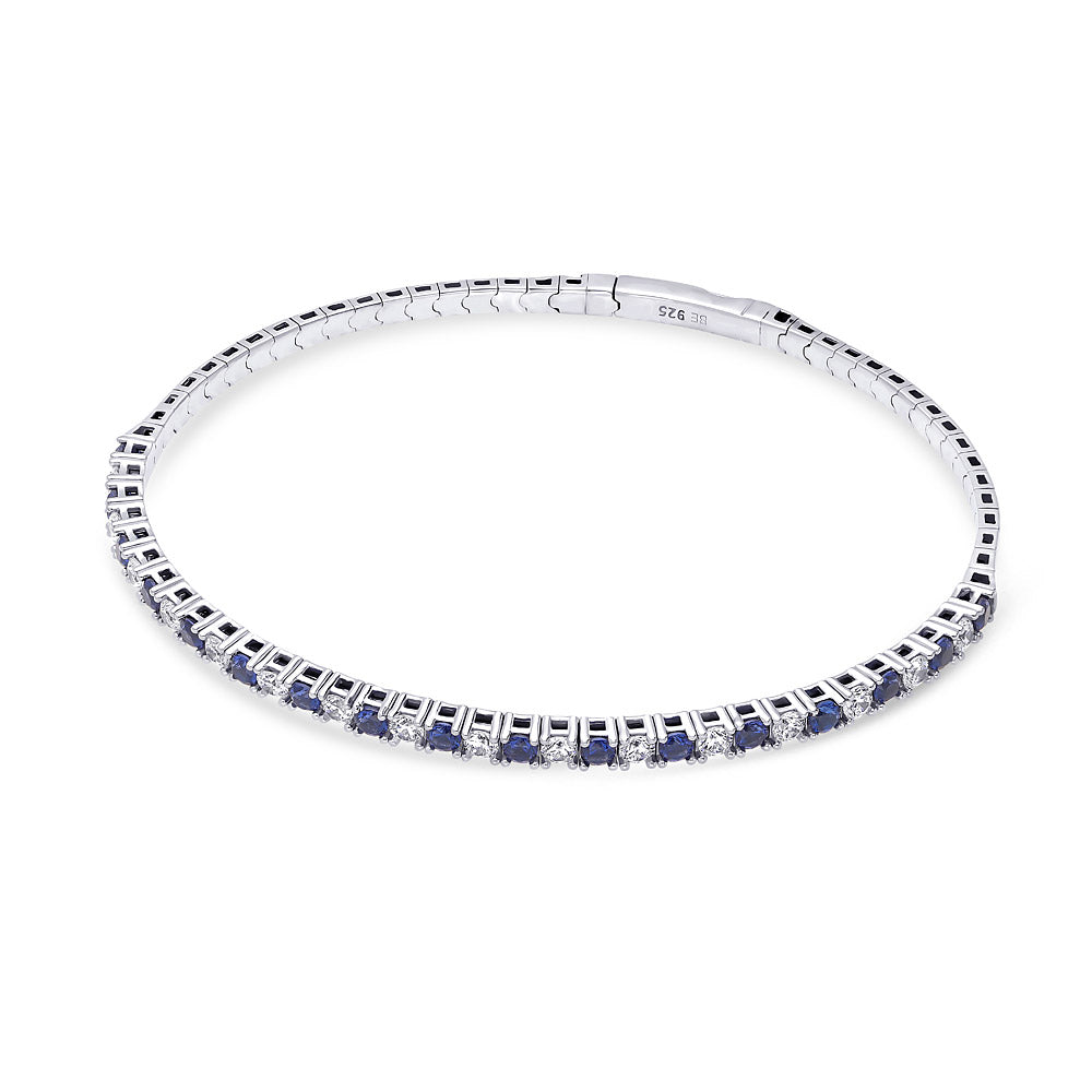 Side view of Flexible Simulated Blue Sapphire CZ Bangle in Sterling Silver, 6 of 9