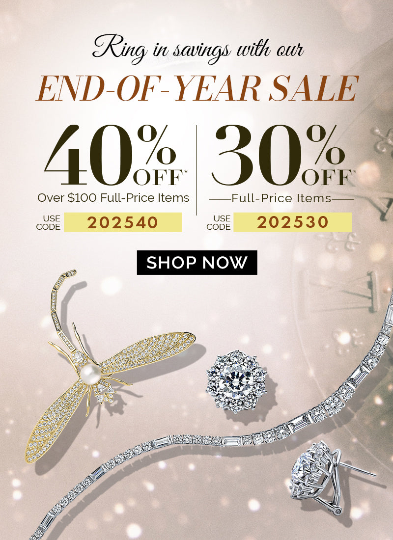 End-of-Year Sale banner with a festive golden background featuring sparkling jewelry, including a cubic zirconia bracelet, earrings, and a gold plated dragonfly brooch with a pearl. Text highlights '40% off over $100 full-price items' and '30% off full-price items' with discount codes '202540' and '202530' respectively. A clock showing midnight adds a New Year theme.