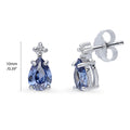 Front view of Solitaire 2-Stone Pear Stud Earrings in Sterling Silver 1.4ct, Tanzanite Color