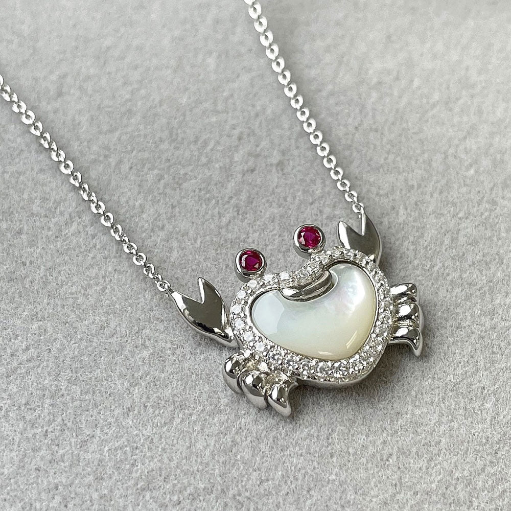 Flatlay view of Crab Mother Of Pearl Necklace in Sterling Silver, 7 of 8