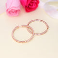 Flatlay view of CZ Large Inside-Out Hoop Earrings in Sterling Silver 1.9 inch, Rose Gold Flashed