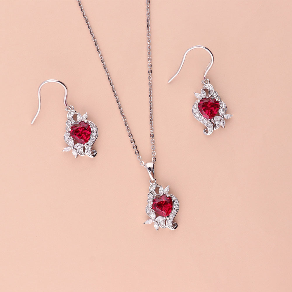 Flatlay view of Heart Flower CZ Necklace and Earrings in Sterling Silver, 12 of 19