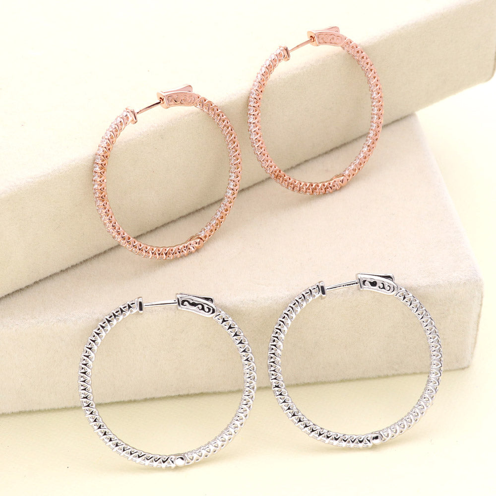 Flatlay view of CZ Medium Inside-Out Hoop Earrings in Sterling Silver 1.4 inch, Rose Gold Flashed