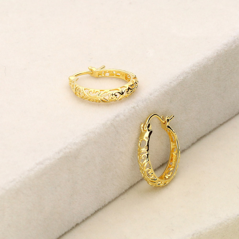 Flatlay view of Filigree Medium Hoop Earrings in Sterling Silver 0.75 inch, Yellow Gold Flashed