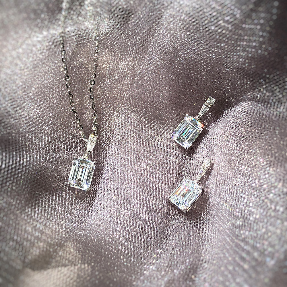 Flatlay view of Solitaire 1.7ct Emerald Cut CZ Necklace in Sterling Silver, 2 of 5