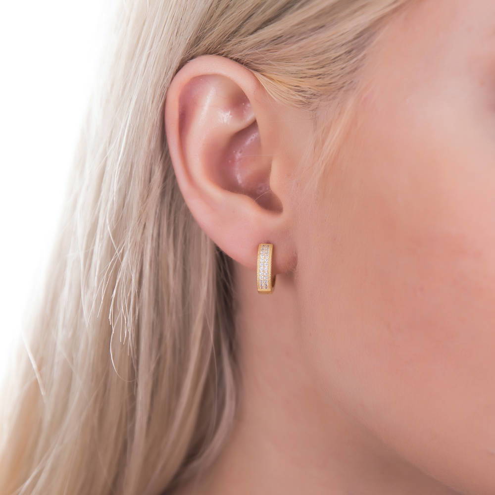 Model wearing Milgrain CZ Small Huggie Earrings in Sterling Silver 0.56 inch, 2 of 6