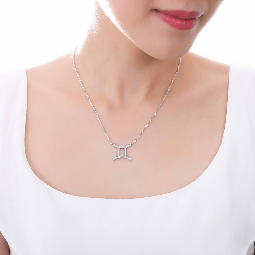 Model wearing Zodiac Sign CZ Necklace in Sterling Silver, 2 of 9