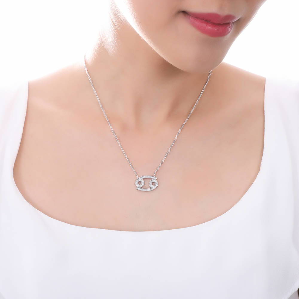 Model wearing Zodiac Sign CZ Necklace in Sterling Silver, 5 of 9