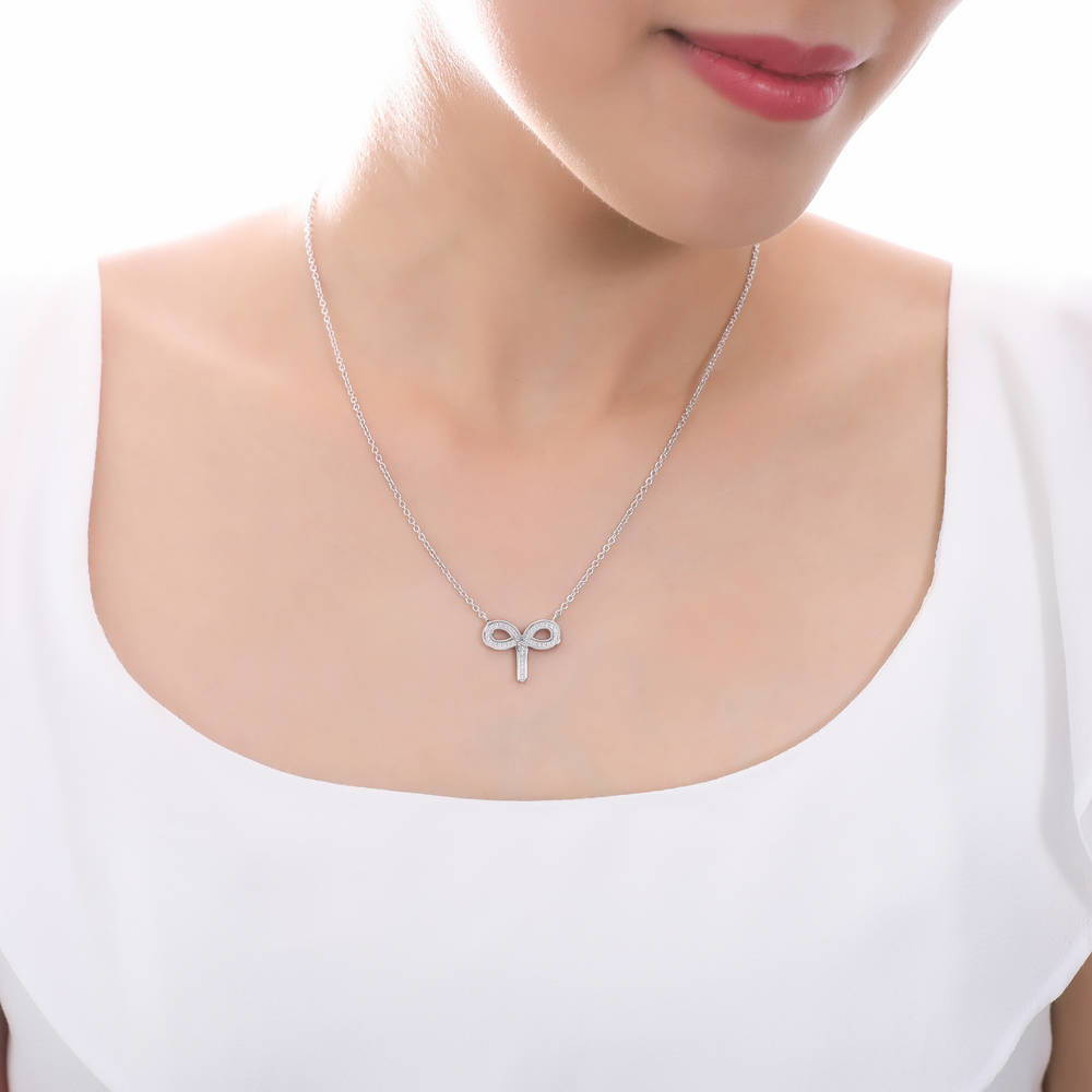 Model wearing Zodiac Sign CZ Necklace in Sterling Silver, 6 of 9