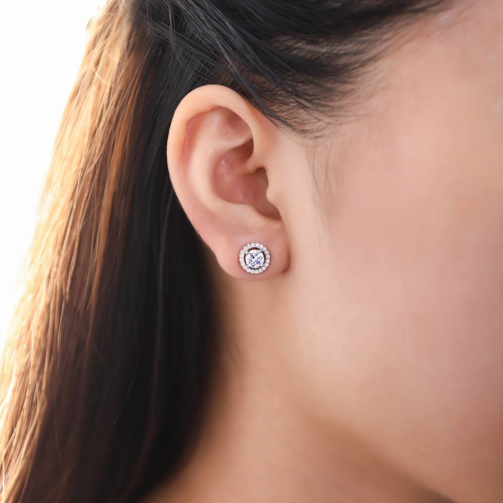 Model wearing Halo CZ Stud Earrings in Sterling Silver, 7 of 9