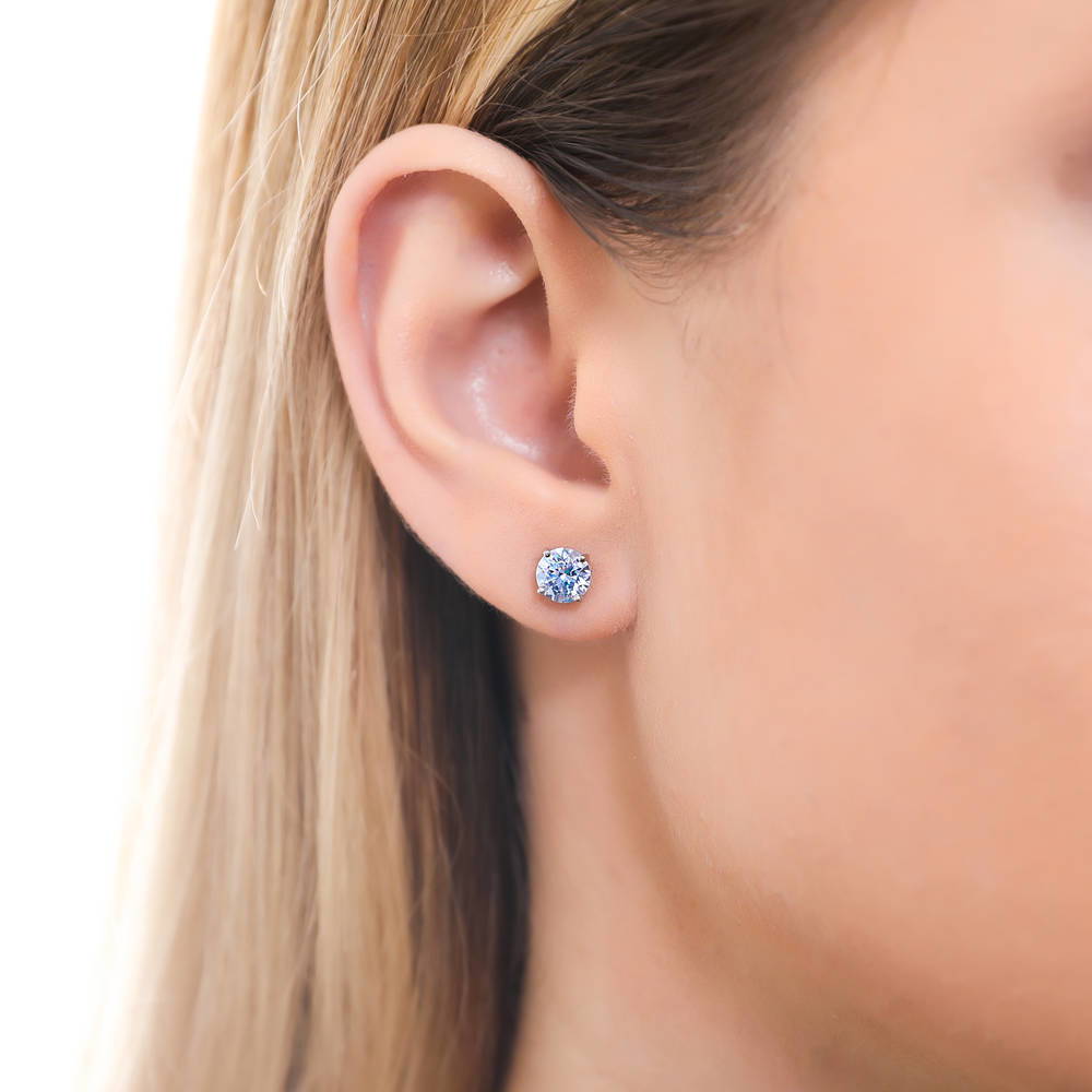 Model wearing Solitaire 1.6ct CZ Stud Earrings in Sterling Silver, 12 of 18