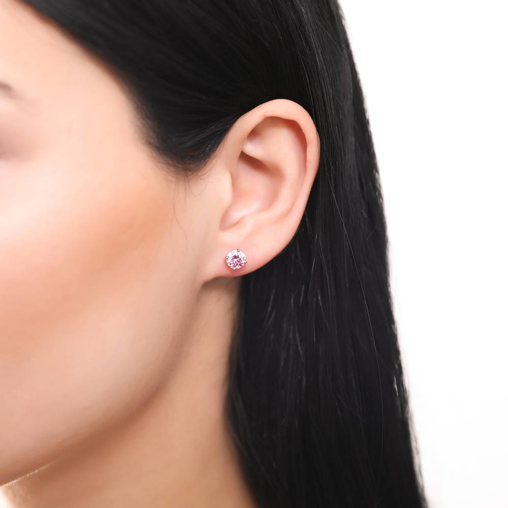 Model wearing Solitaire 1.6ct CZ Stud Earrings in Sterling Silver, 2 of 17