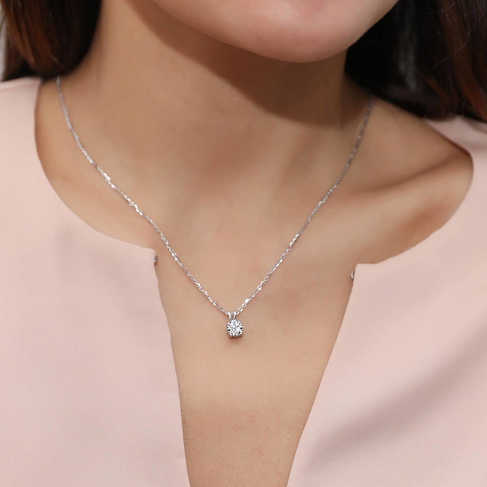 Model wearing Solitaire CZ Necklace in Sterling Silver, 7 of 11