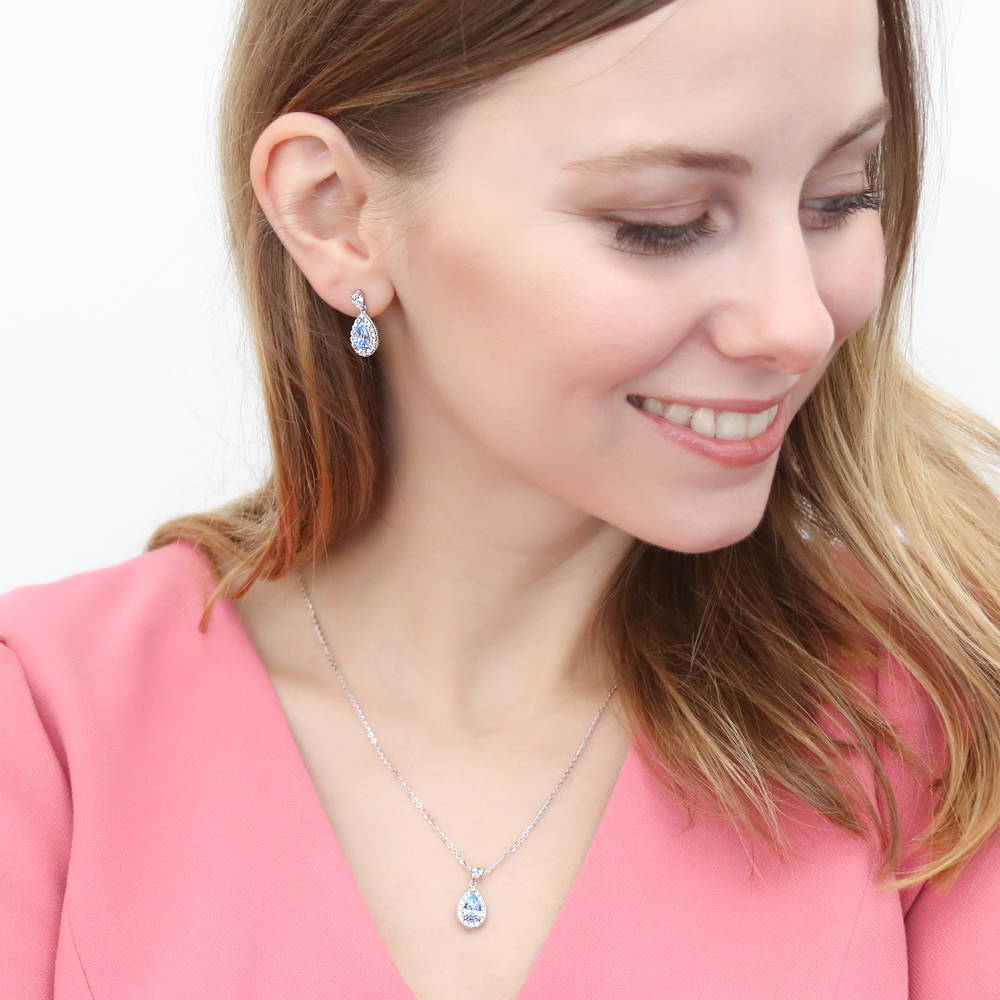 Model wearing Halo Pear CZ Necklace in Sterling Silver, 13 of 15