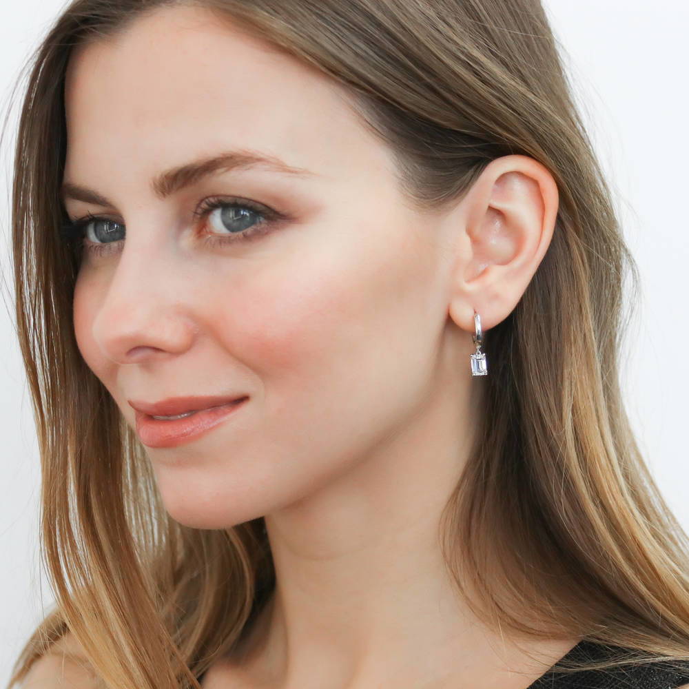 Model wearing Solitaire CZ Huggie Earrings in Sterling Silver 0.5 inch, 14 of 14