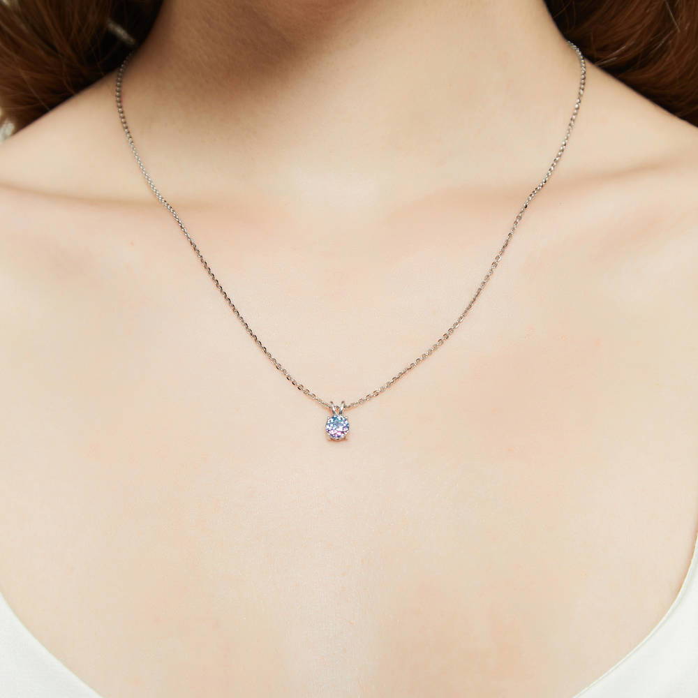 Model wearing Kaleidoscope Solitaire CZ Necklace in Sterling Silver 0.8ct, Purple Aqua Color