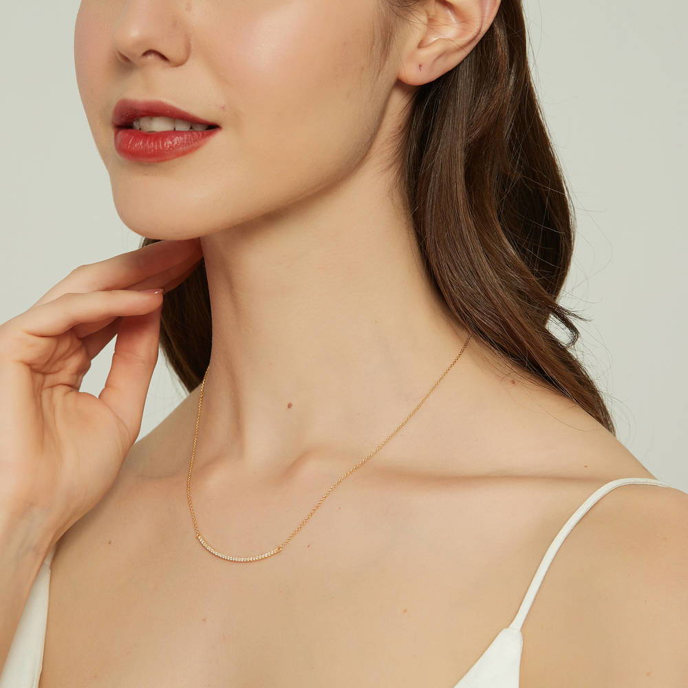 Model wearing Bar CZ Pendant Necklace in Sterling Silver, Yellow Gold Flashed