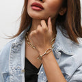 Model wearing Paperclip Link Bracelet, Gold-Tone