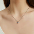 Model wearing Kaleidoscope Solitaire CZ Necklace in Sterling Silver 0.8ct, Purple Aqua Color