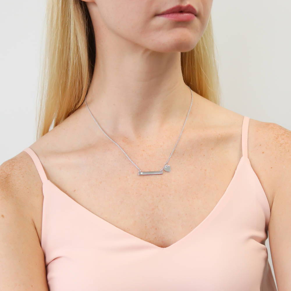 Model wearing Bar Heart CZ Necklace in Sterling Silver, 8 of 10