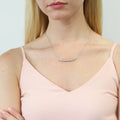 Model wearing Graduated Bar CZ Necklace in Sterling Silver, Yellow Gold Flashed