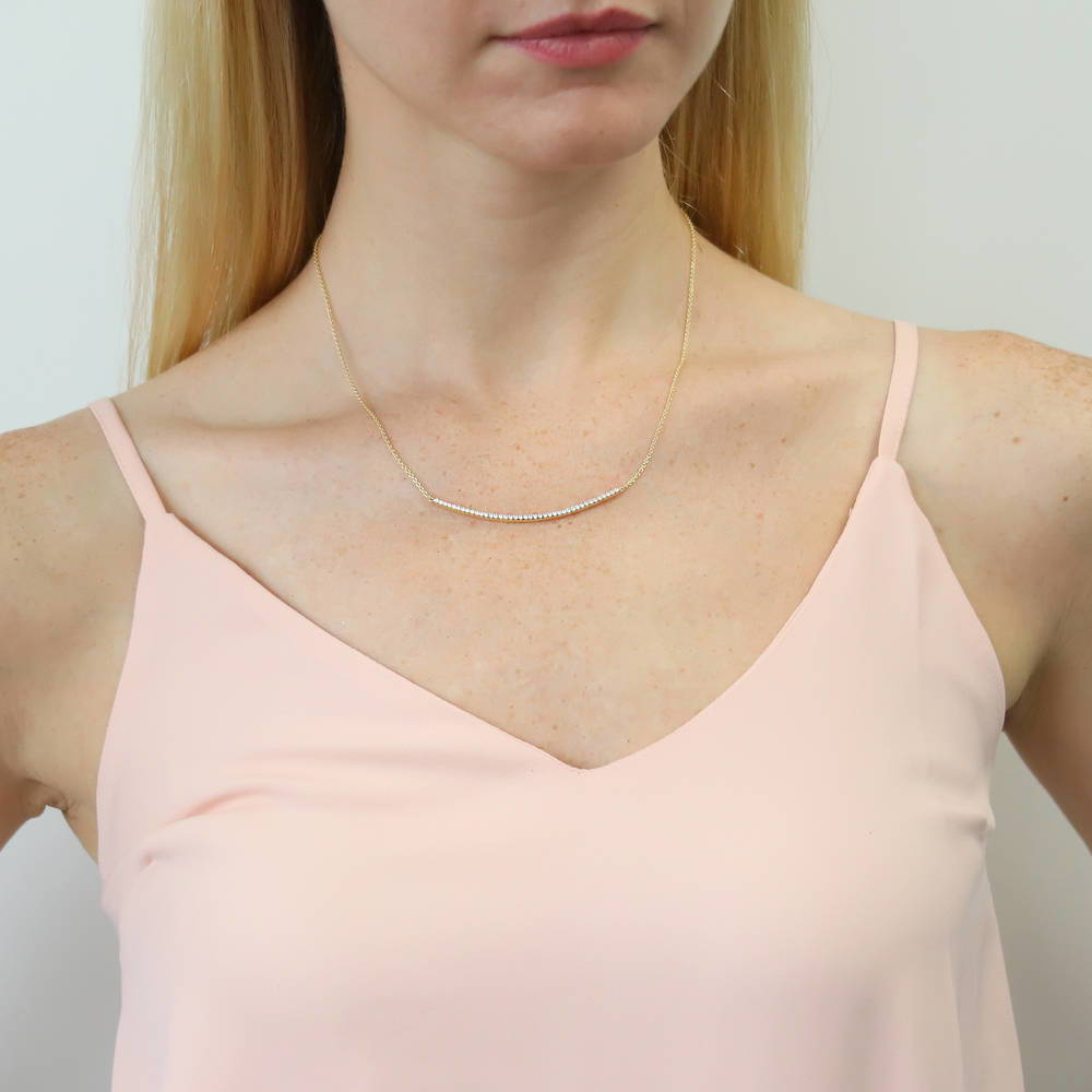 Model wearing Bar CZ Pendant Necklace in Sterling Silver, Yellow Gold Flashed