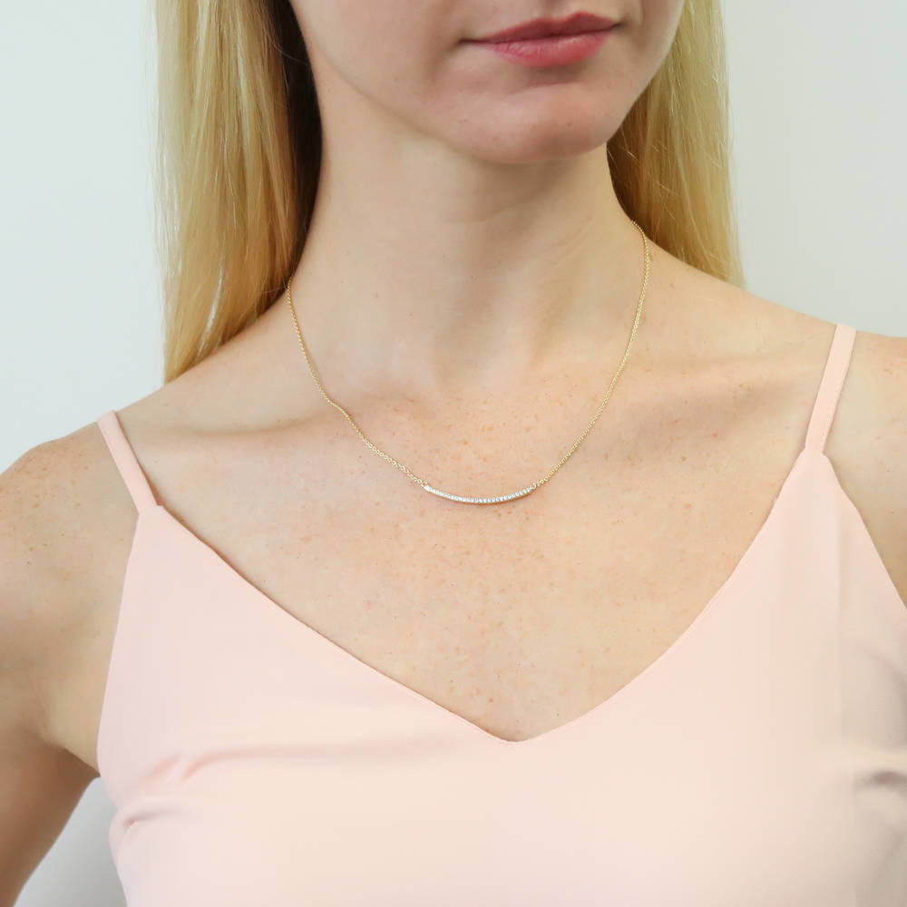 Model wearing Bar CZ Pendant Necklace in Sterling Silver, Yellow Gold Flashed