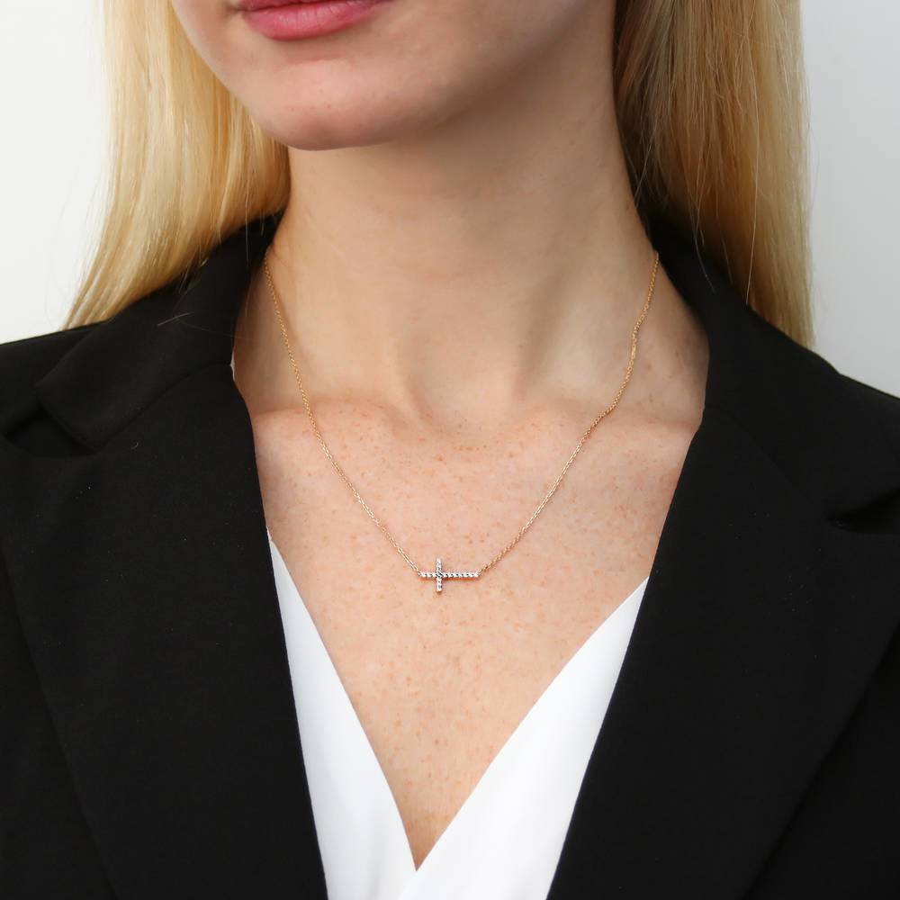 Model wearing Sideways Cross CZ Necklace in Sterling Silver, 7 of 10