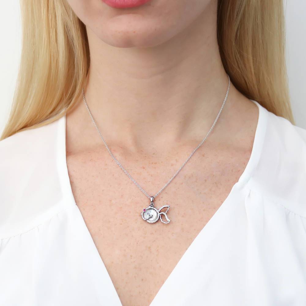 Model wearing Fish Mother Of Pearl Necklace in Sterling Silver, 6 of 7