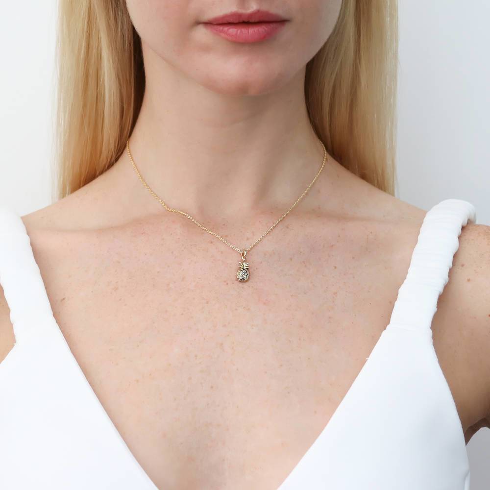 Model wearing Pineapple CZ Necklace in Sterling Silver, Yellow Gold Flashed