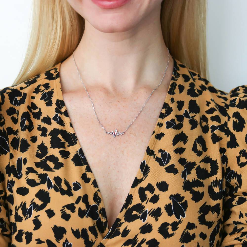 Model wearing Heartbeat CZ Necklace in Sterling Silver, Rose Gold Flashed