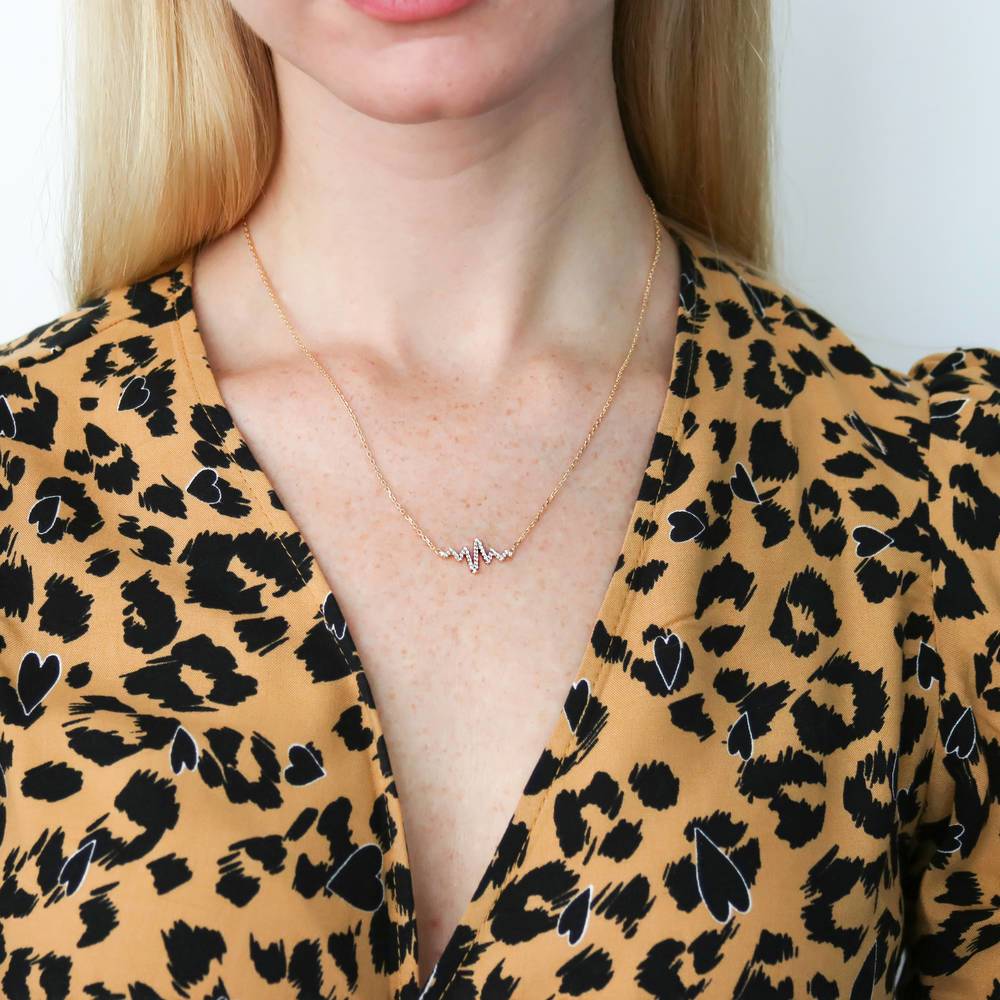 Model wearing Heartbeat CZ Necklace in Sterling Silver, 7 of 9