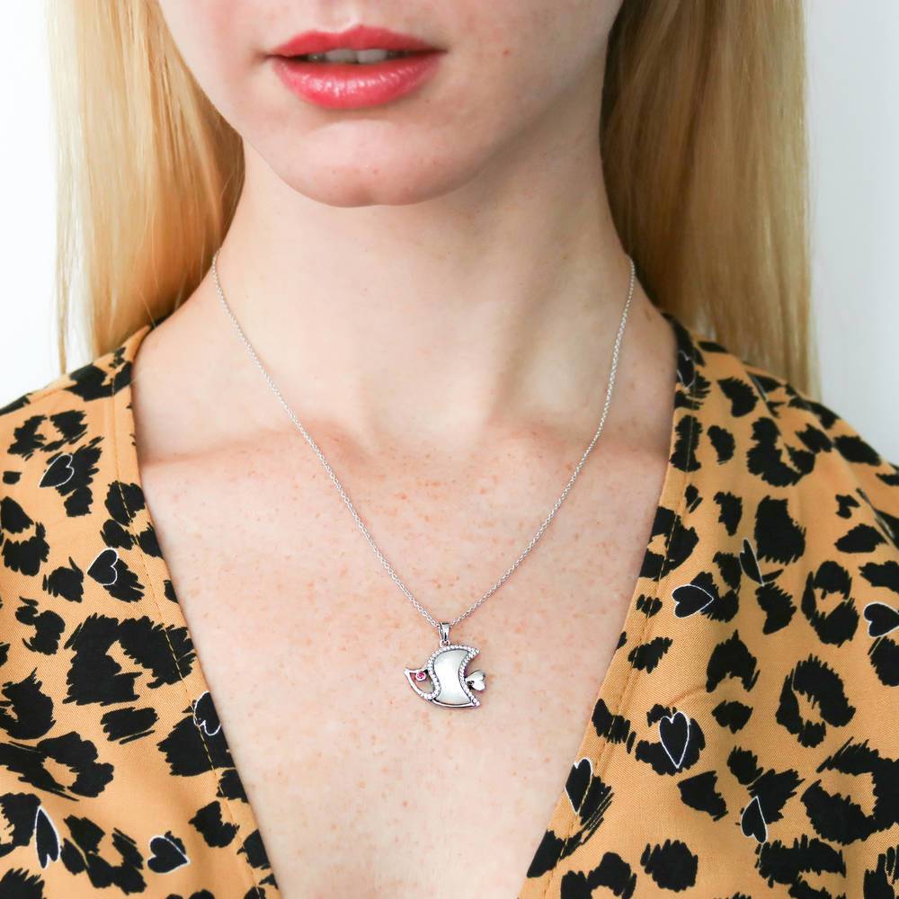 Model wearing Fish Mother Of Pearl Necklace in Sterling Silver, 6 of 7