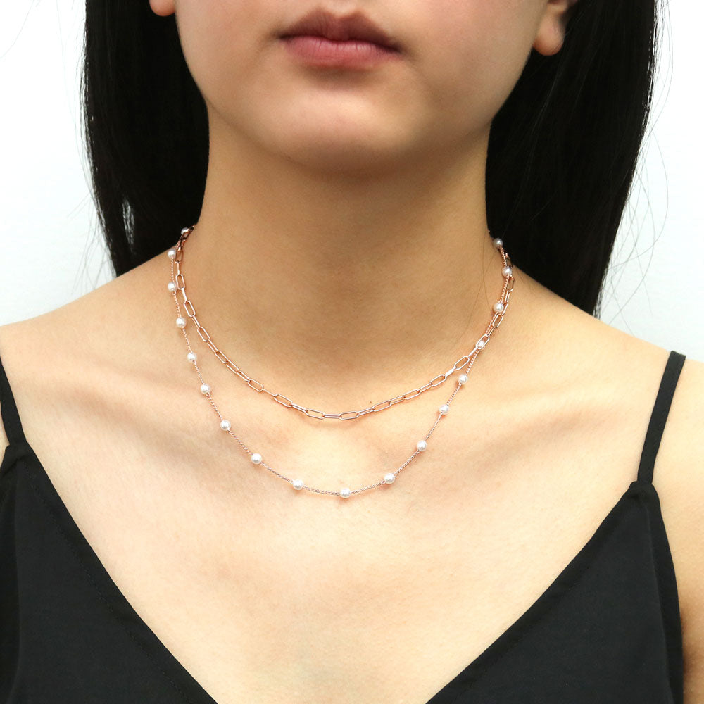 Model wearing Paperclip Imitation Pearl Link Chain Necklace, 2 Piece, 2 of 18