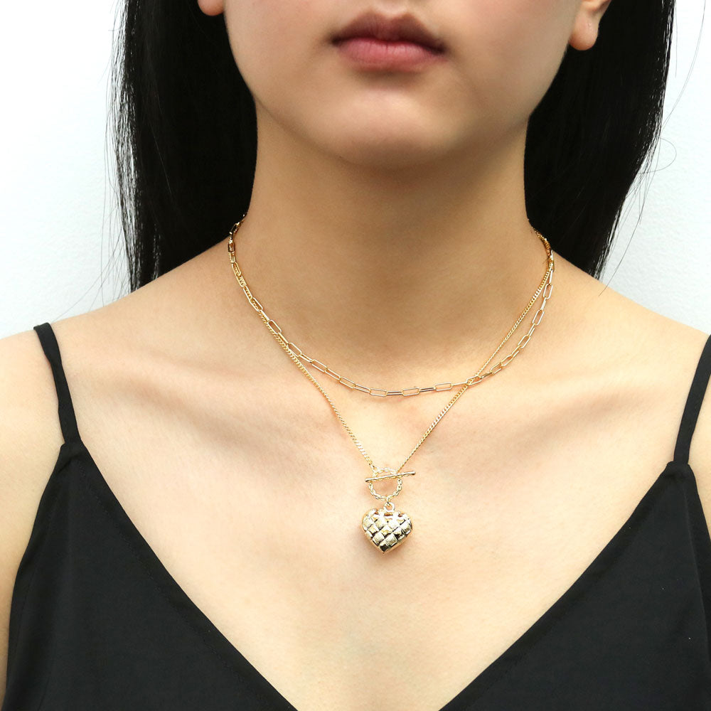 Model wearing Paperclip Link Chain Necklace, 2 Piece, Yellow Gold Flashed