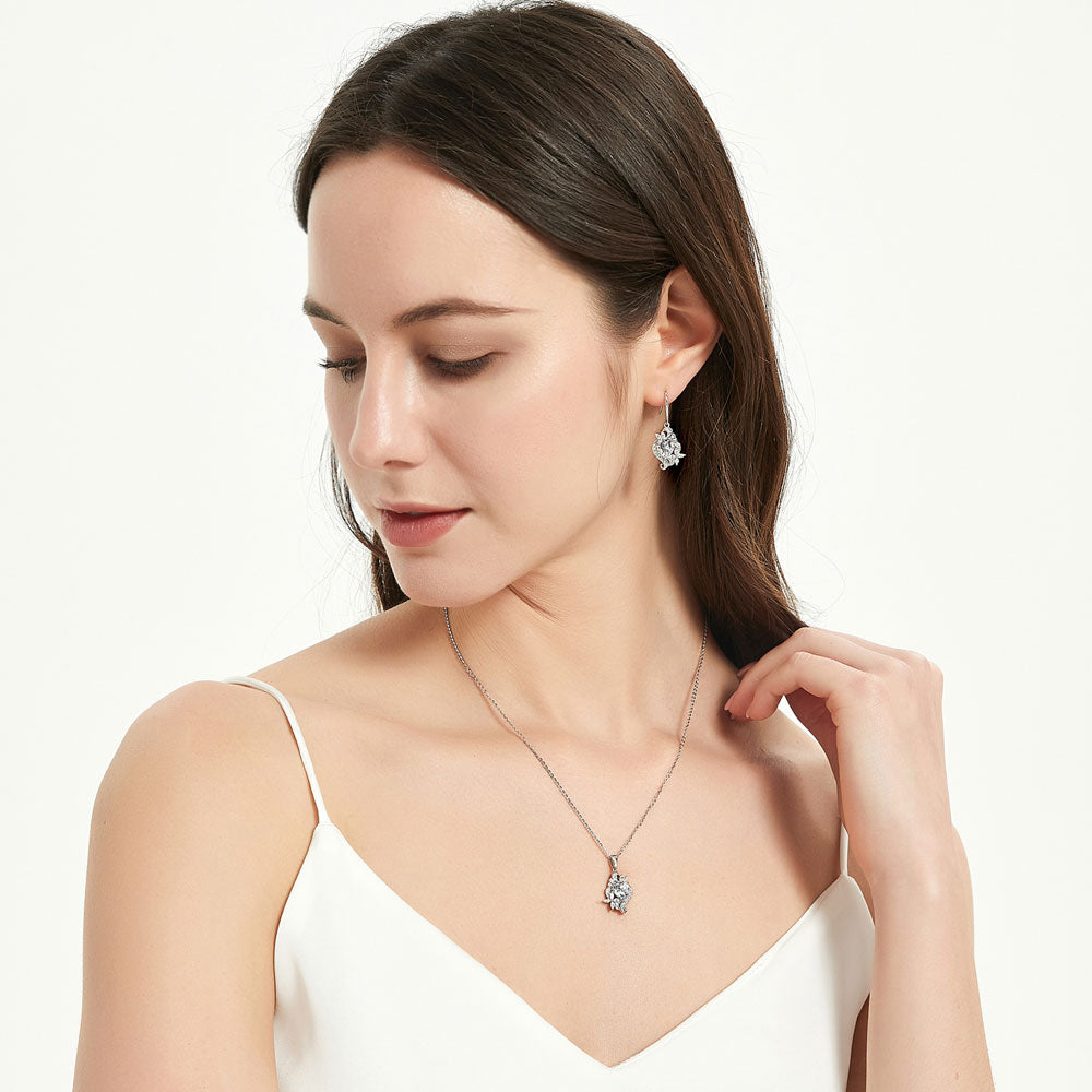 Model wearing Heart Flower CZ Necklace and Earrings in Sterling Silver, 14 of 20