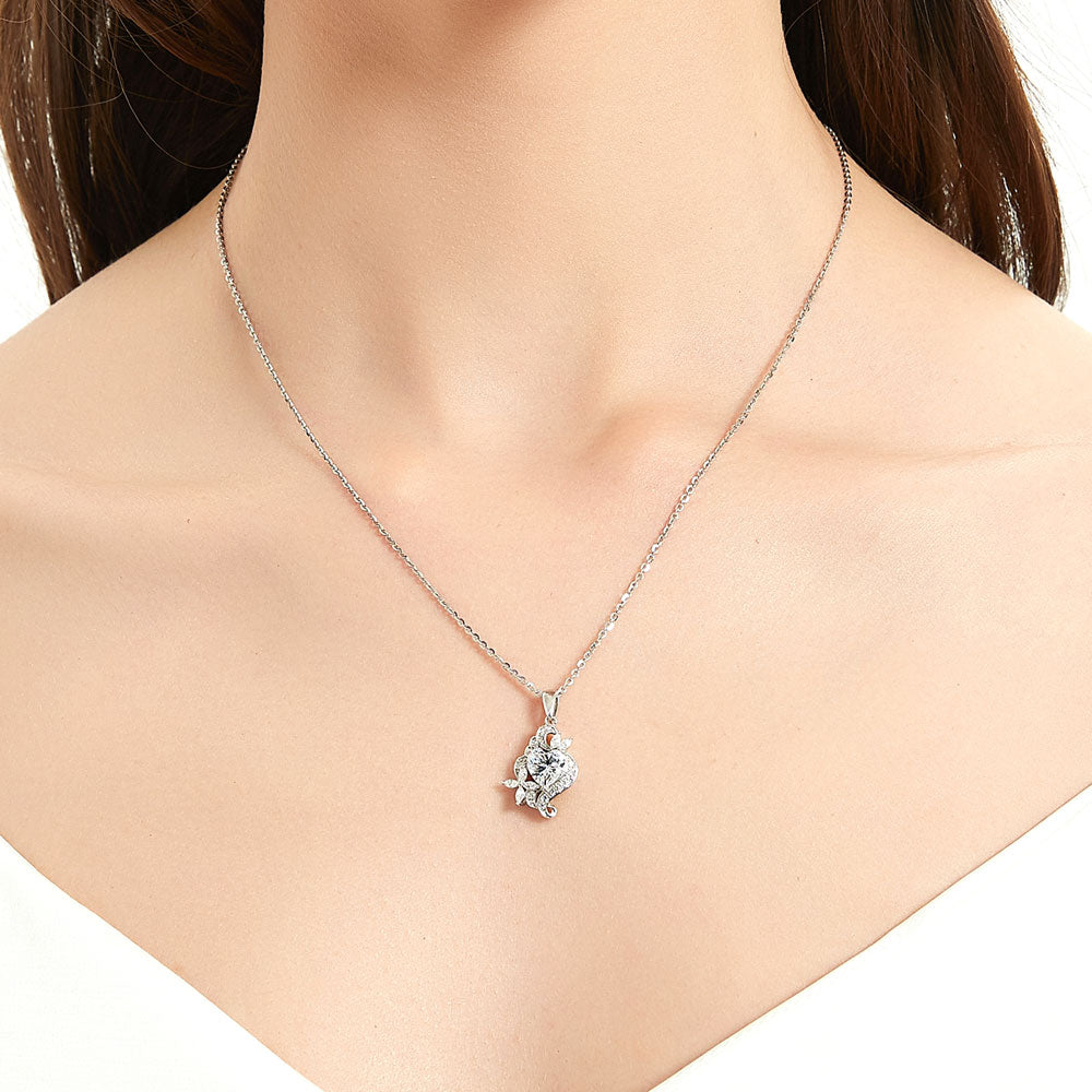 Model wearing Heart Flower CZ Necklace and Earrings in Sterling Silver, 12 of 20