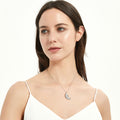 Model wearing Feather CZ Pendant Necklace in Sterling Silver, Rhodium Plated