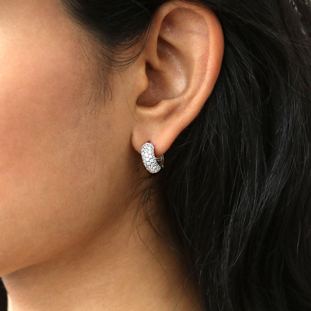 Model wearing Dome CZ Huggie Earrings in Sterling Silver, 2 Pairs, 6 of 13