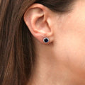 Model wearing Halo CZ Stud Earrings in Sterling Silver, Sapphire Color