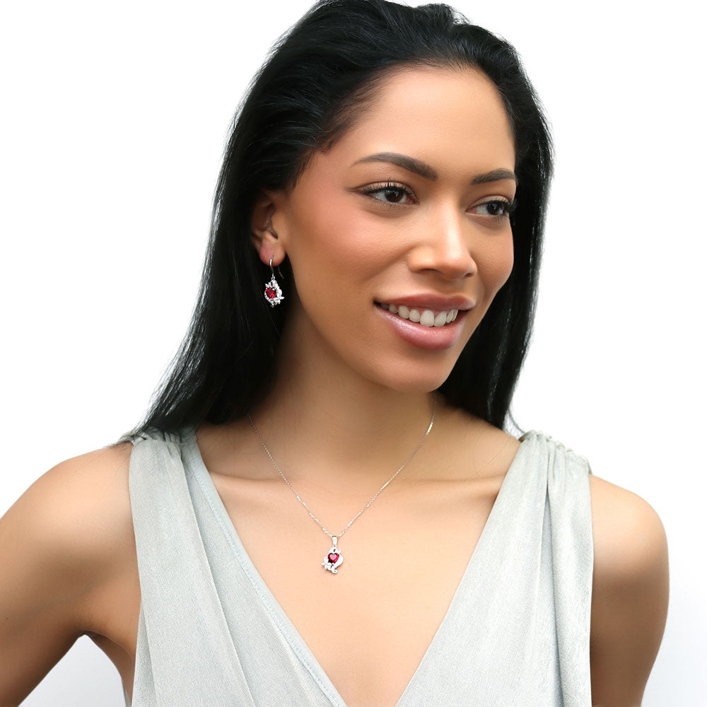 Model wearing Heart Flower CZ Necklace and Earrings in Sterling Silver, 2 of 19