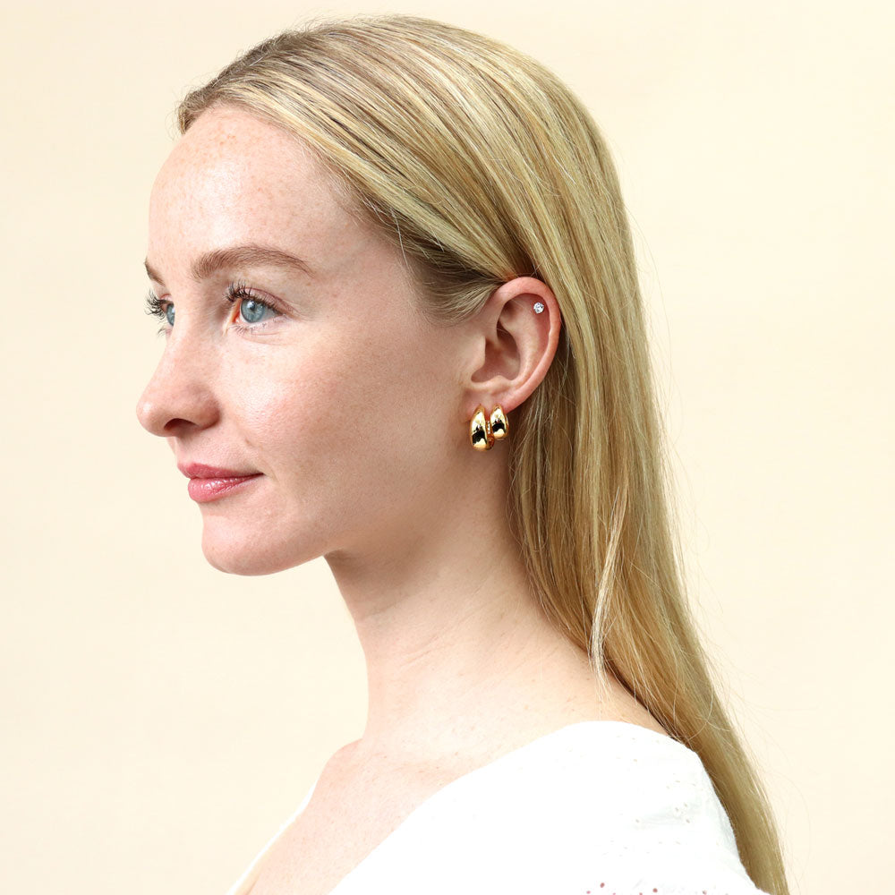 Model wearing Dome Hoop Earrings in Gold Flashed Sterling Silver, 2 Pairs, 17 of 19