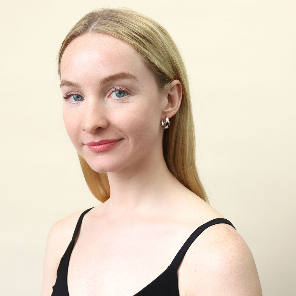 Model wearing Dome Hoop Earrings in Sterling Silver, 2 Pairs, 7 of 16