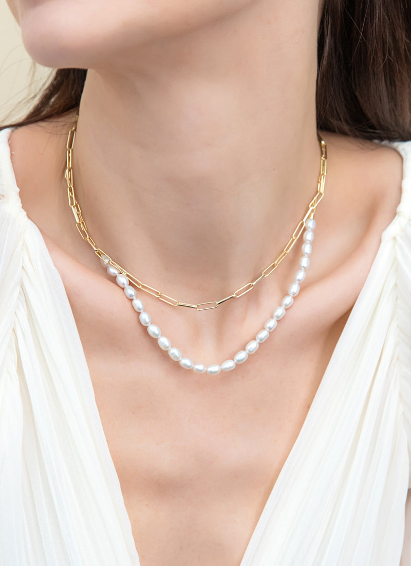 Women Wearing Pearl Jewelry Layered with Paperclip Chain Necklace