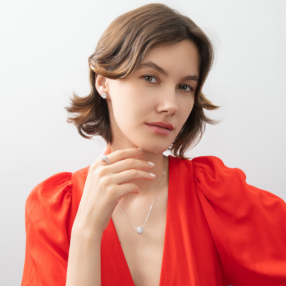 Model wearing Flower Halo CZ Necklace and Earrings in Sterling Silver, 2 of 15