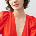 Model wearing Flower Halo CZ Necklace and Earrings in Sterling Silver, Clear Color