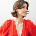 Model wearing Flower Halo CZ Necklace and Earrings in Sterling Silver, Clear Color