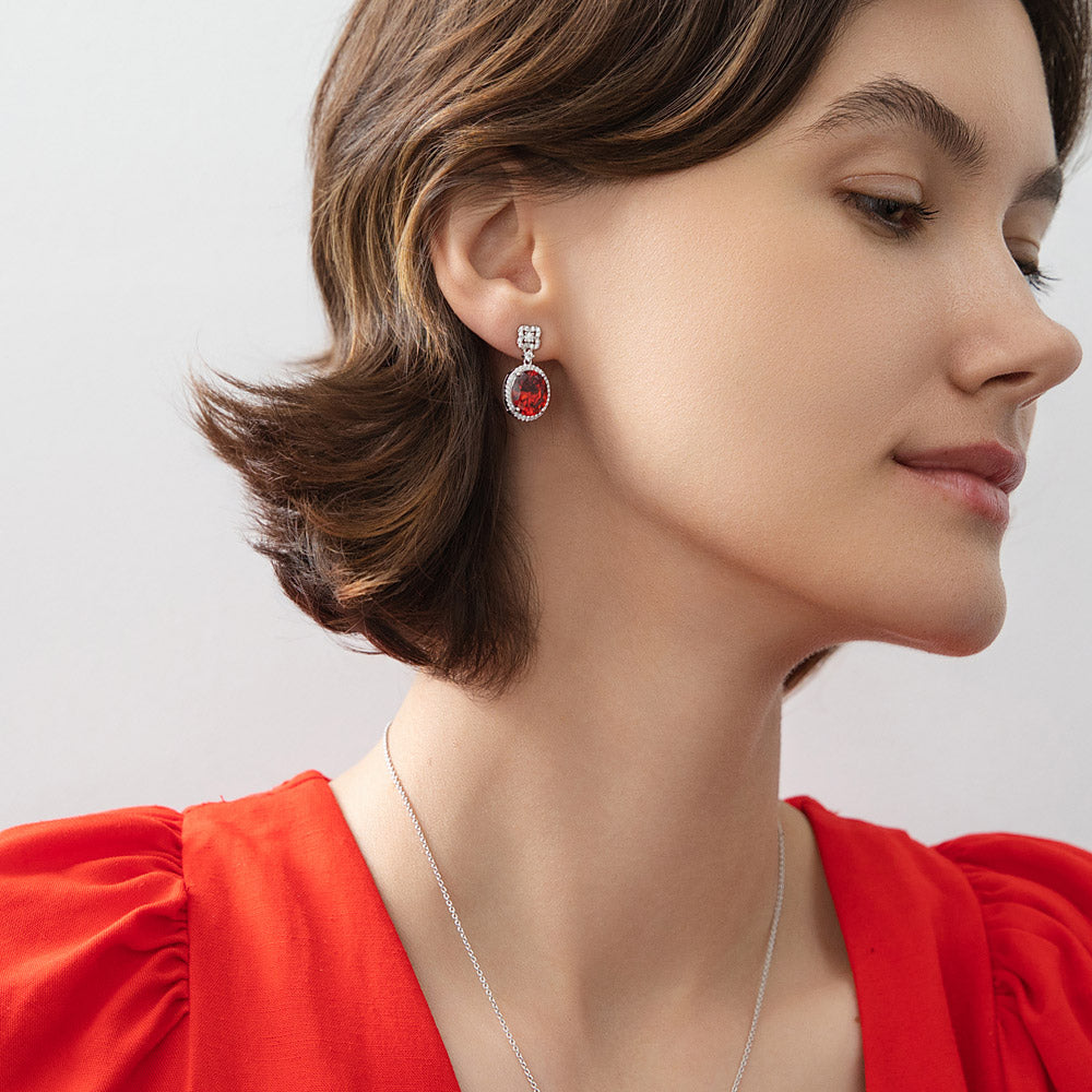 Model wearing Halo Clover Oval CZ Earrings in Sterling Silver, Clear Color