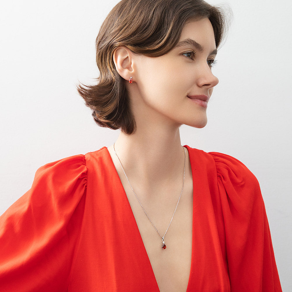 Model wearing Solitaire Pear Necklace in Sterling Silver 1ct, 9 of 13